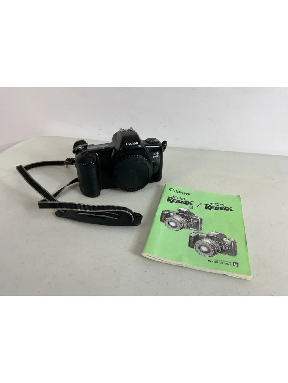 Canon EOS Rebel X S 35mm SLR Film Camera with Strap & Booklet Film Included